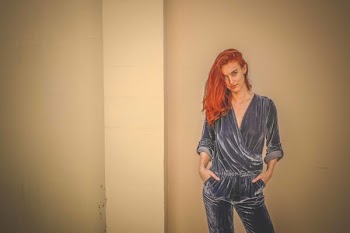Woman Wearing Black Velvet Surplice Long-sleeved Jumpsuit