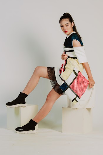 Woman Wearing Black, White, and Beige Off-shoulder Dress