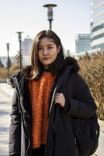 Woman Wearing Black Zip-up Jacket