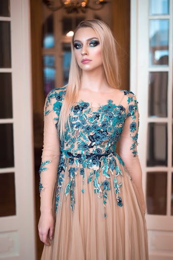 Woman Wearing Blue And Beige Floral Dress