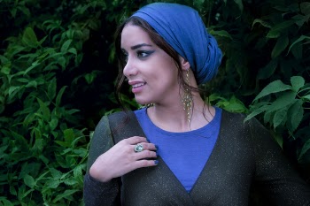 Woman Wearing Blue and Black Crew-neck Top