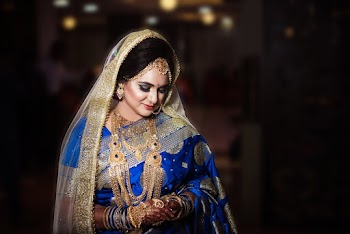 Woman Wearing Blue And Gold Saree Dress