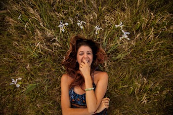 Woman Wearing Blue and Multicolored Floral Cami Top