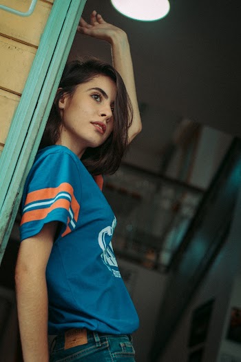 Woman Wearing Blue and Orange Crew-neck Shirt