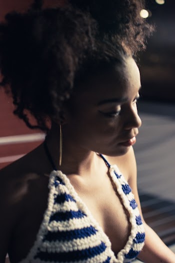 Woman Wearing Blue And White Knitted Bra