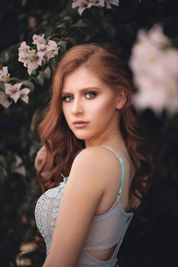 Woman Wearing Blue and White Sleeveless Stop