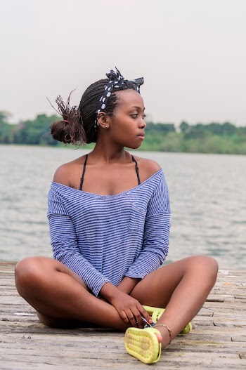 Woman Wearing Blue And White Striped Shirt