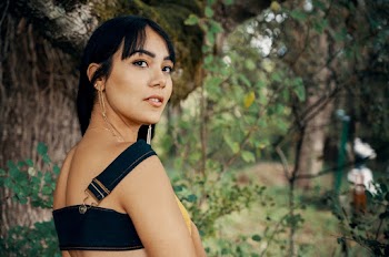 Woman Wearing Blue and Yellow Denim Top Under the Tree