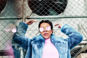Woman Wearing Blue Coat With Pink Inner Shirt