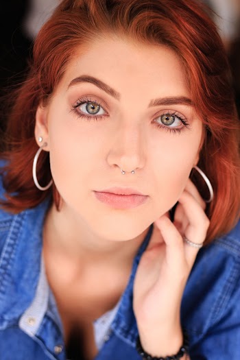 Woman Wearing Blue Denim Collared Shirt