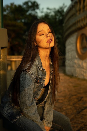 Woman Wearing Blue Denim Jacket