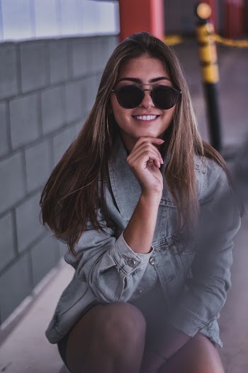 Woman Wearing Blue Denim Jacket