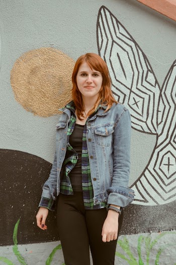 Woman Wearing Blue Denim Jacket 