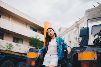 Woman Wearing Blue Denim Jacket