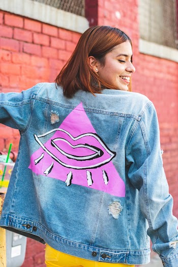 Woman Wearing Blue Denim Jacket