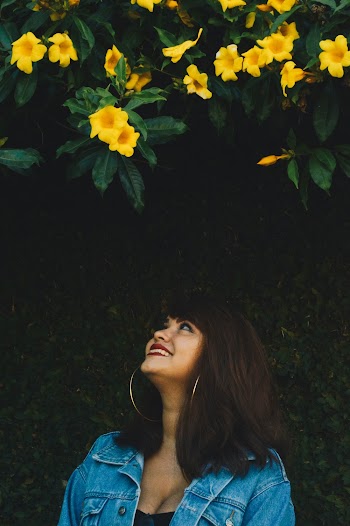 Woman Wearing Blue Denim Jacket