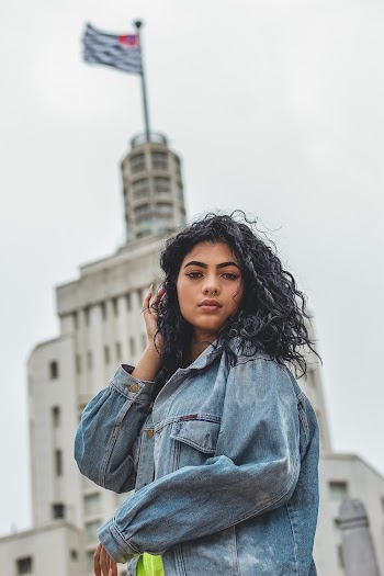 Woman Wearing Blue Denim Jacket