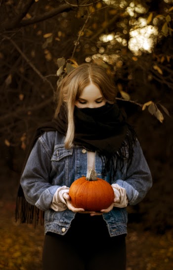Woman Wearing Blue Denim Jacket and Black Scarf