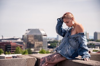 Woman Wearing Blue Denim Jacket Sitting 