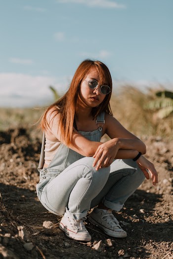 Woman Wearing Blue Denim Overalls