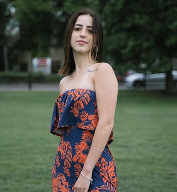 Woman Wearing Blue Floral Strapless Dress