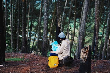 Woman Wearing Blue Knit Cap