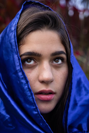 Woman Wearing Blue Scarf