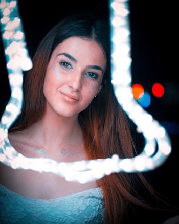 Woman Wearing Blue Scoop-neck Top