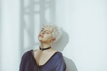 Woman Wearing Blue Shirt