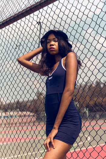 Woman Wearing Blue Sleeveless Top