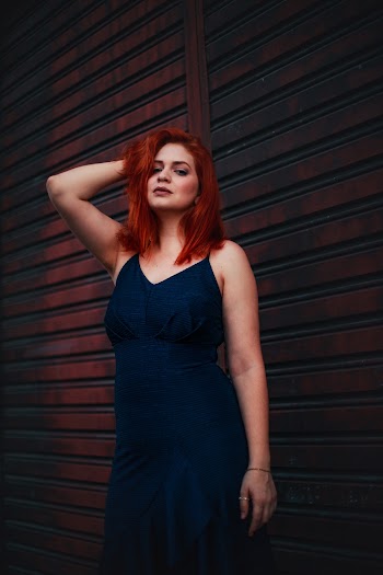 Woman Wearing Blue Spaghetti Strap Dress