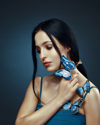 Woman Wearing Blue Spaghetti-strap Top