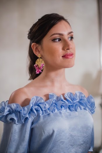 Woman Wearing Blue Strapless Dress