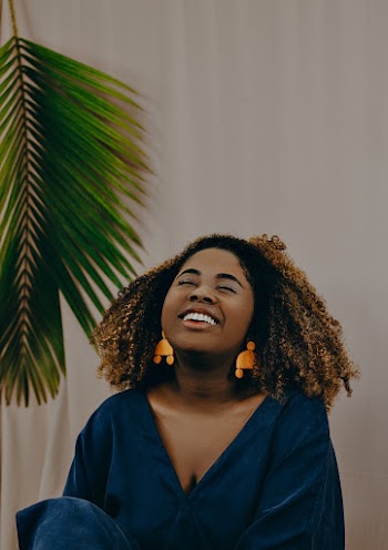Woman Wearing Blue V Neck Top