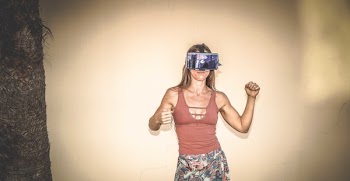 Woman Wearing Blue Vr Headset