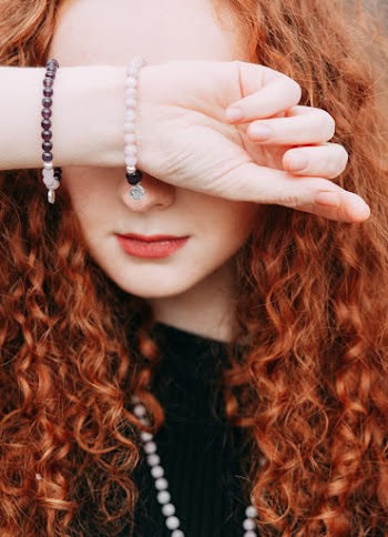 Woman Wearing Bracelets and Necklace