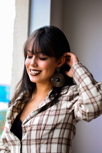 Woman Wearing Brown and Beige Sports Shirt