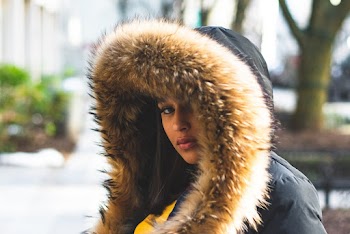 Woman Wearing Brown And Black Parka Coat