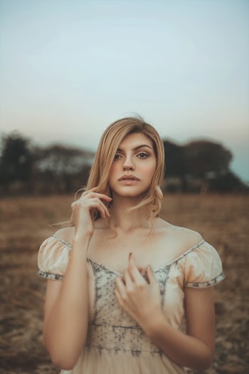 Woman Wearing Brown and Grey Dress