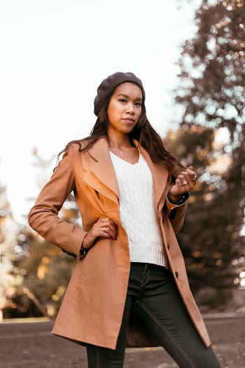 Woman Wearing Brown Coat and Black Denim Jeans