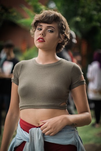 Woman Wearing Brown Crew-neck Crop Top