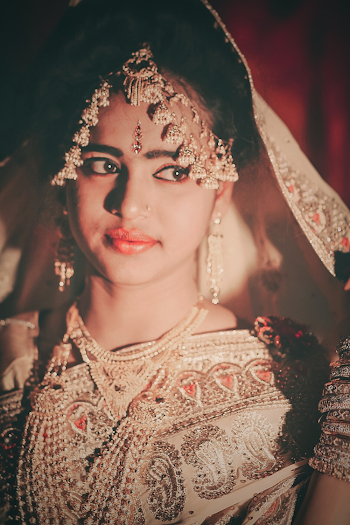 Woman Wearing Brown Dress and Headdress