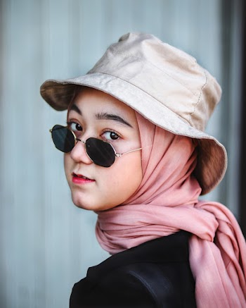 Woman Wearing Brown Hat