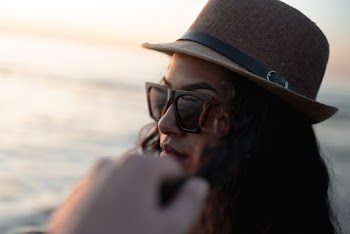 Woman Wearing Brown Hat and Eyeglasses