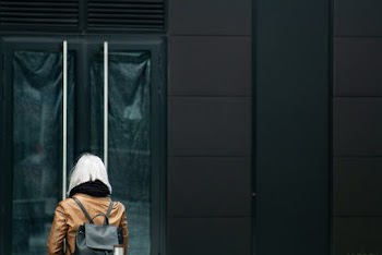 Woman Wearing Brown Jacket