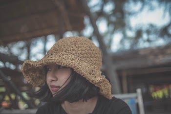 Woman Wearing Brown Knitted Hat