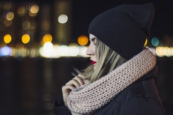Woman Wearing Brown Knitted Scarf