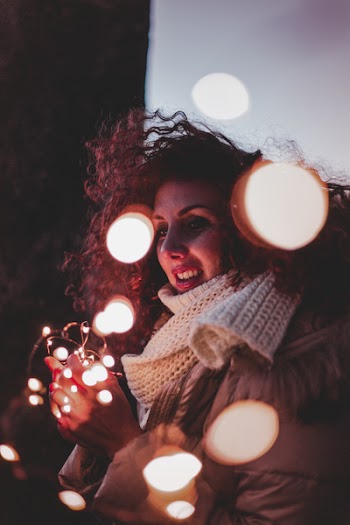 Woman Wearing Brown Leather Jacket and Knitted Scarf