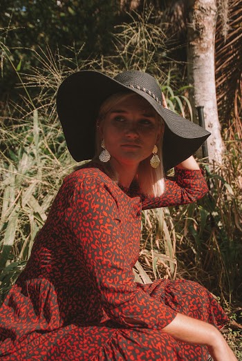 Woman Wearing Brown Long-sleeved Dress