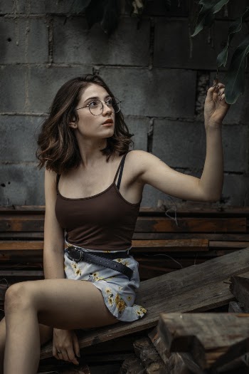 Woman Wearing Brown Spaghetti Strap Blouse